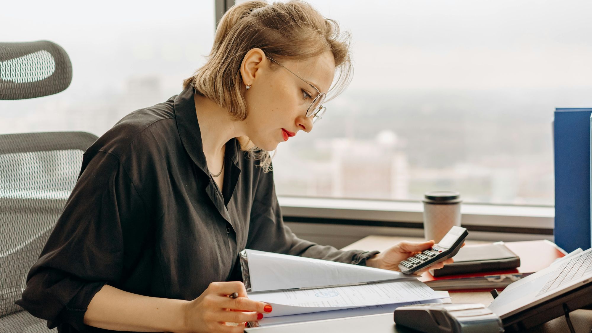 A Certified Public Accountant is working in her office